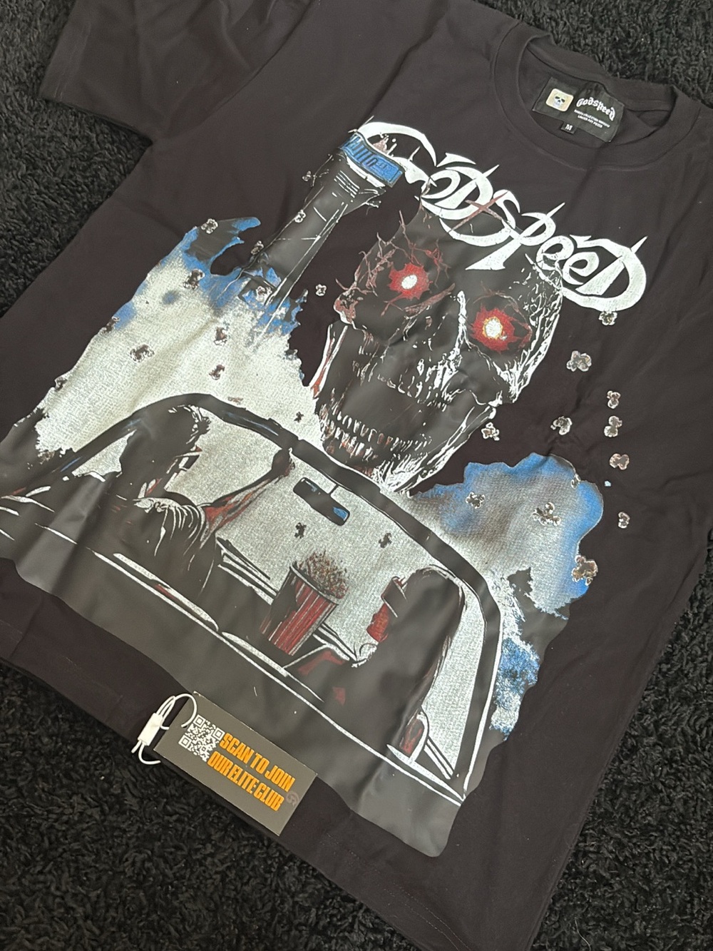 GodSpeed Oddiseed Graphic Skull Band Tee in Black with Red & Blue Accents